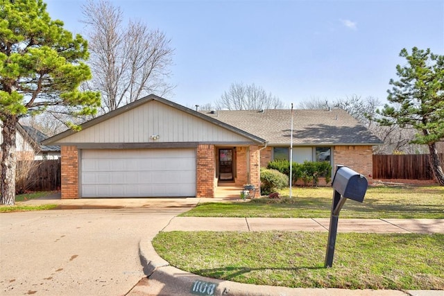 ranch-style home with an attached garage, fence, brick siding, and driveway