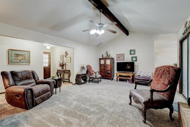 carpeted living room with visible vents, vaulted ceiling with beams, and ceiling fan