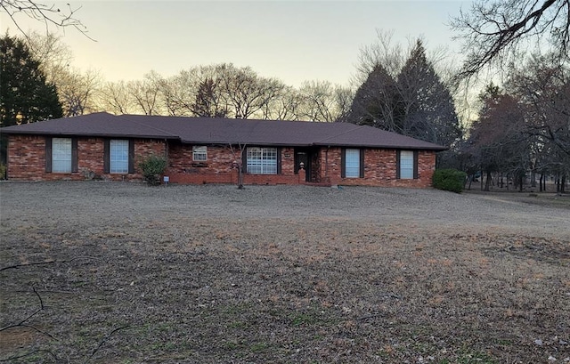 view of front of home with brick siding