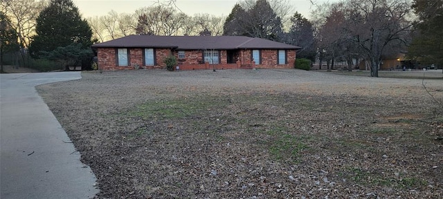 view of front of home with brick siding