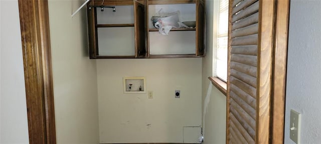 laundry area with cabinet space, washer hookup, and hookup for an electric dryer