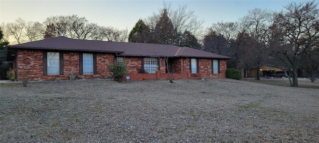 view of front of home featuring brick siding