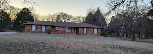 view of front facade featuring brick siding