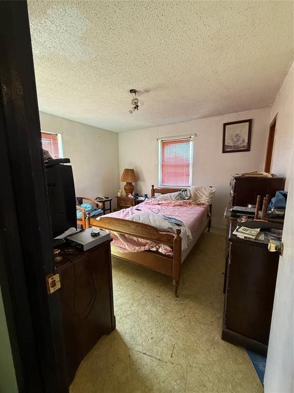 bedroom with a textured ceiling