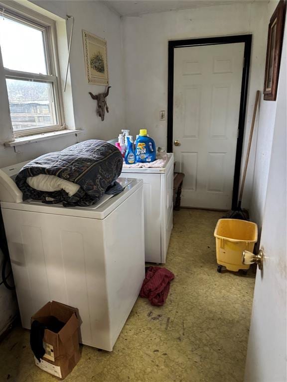 laundry area with laundry area and washer and clothes dryer