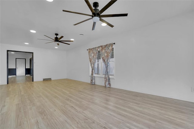 unfurnished room featuring light wood-style flooring, ceiling fan, and recessed lighting