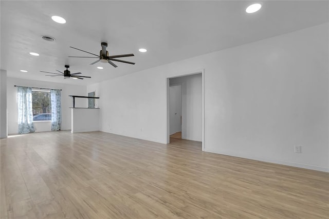 spare room featuring ceiling fan, recessed lighting, visible vents, and light wood-style floors