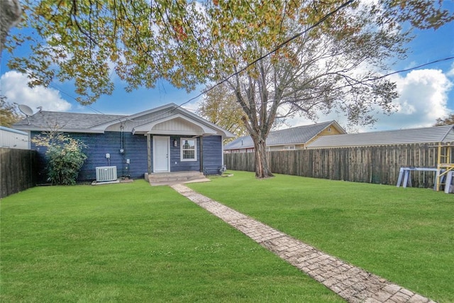 exterior space with a fenced backyard and cooling unit