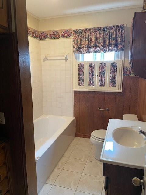 full bath featuring vanity, toilet, and tile patterned floors