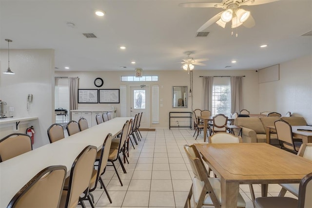 dining space featuring light tile patterned floors, recessed lighting, and visible vents