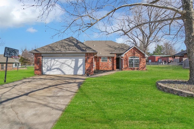 single story home featuring a garage, driveway, brick siding, and a front yard