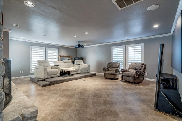 living area with baseboards, visible vents, and recessed lighting