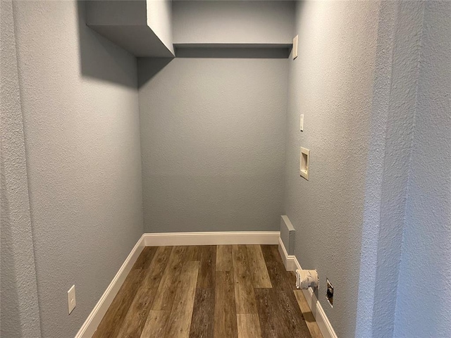 spacious closet with wood finished floors