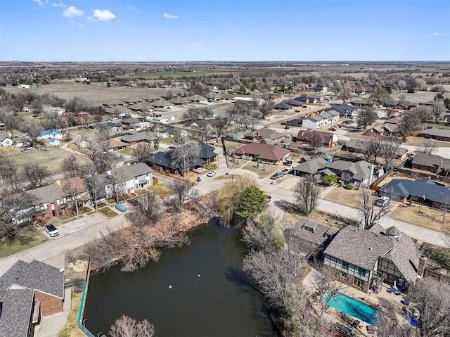 birds eye view of property with a residential view