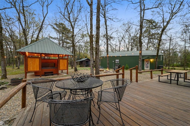 wooden deck with outdoor dining area