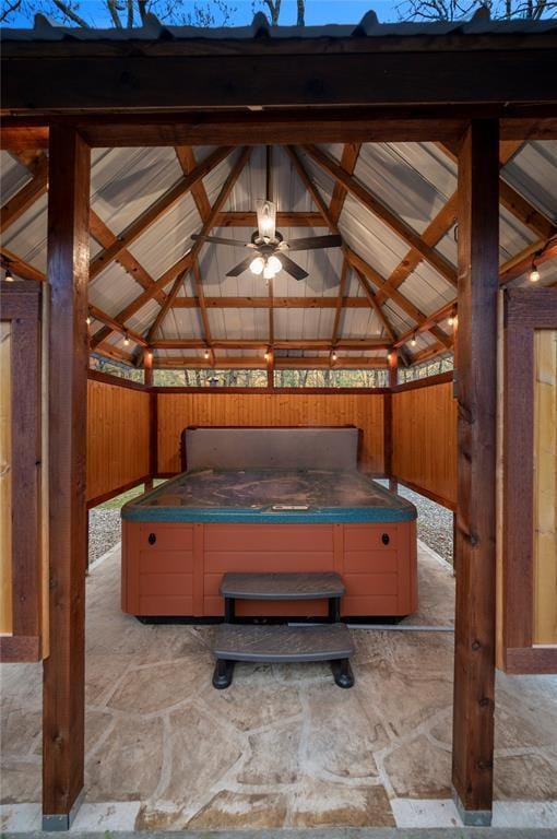 interior space featuring a hot tub and a gazebo