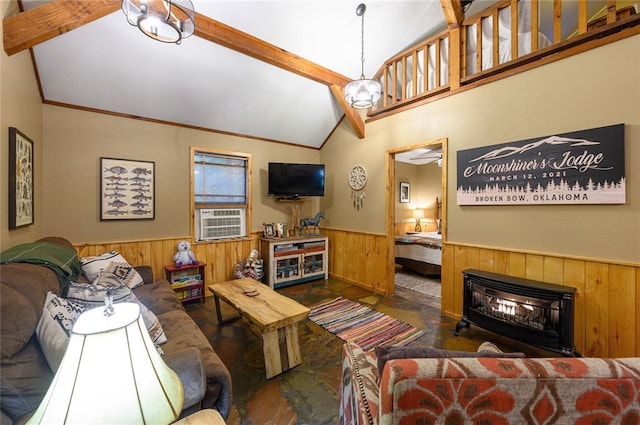 living area with vaulted ceiling with beams, cooling unit, wood walls, a fireplace, and wainscoting