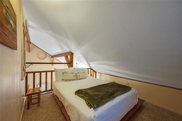 carpeted bedroom featuring lofted ceiling and a textured ceiling