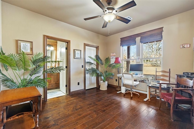 office space with hardwood / wood-style flooring, ceiling fan, visible vents, and baseboards