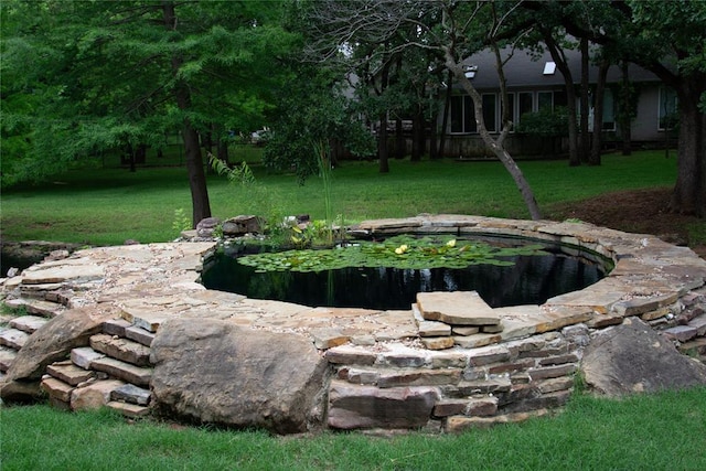 4600 Clipper Xing, Edmond, OK 73013 - view of green lawn featuring a garden pond