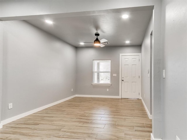 entryway with baseboards, visible vents, a ceiling fan, light wood-style flooring, and recessed lighting