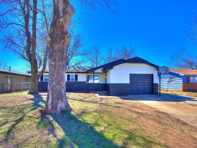 ranch-style house with brick siding, concrete driveway, an attached garage, fence, and a front lawn