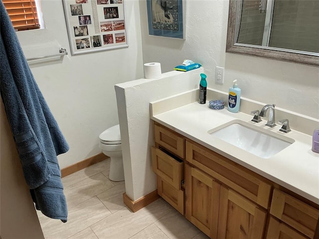 22 W Shore Dr, Arcadia, OK 73007 - bathroom with a shower, toilet, vanity, tile patterned flooring, and baseboards