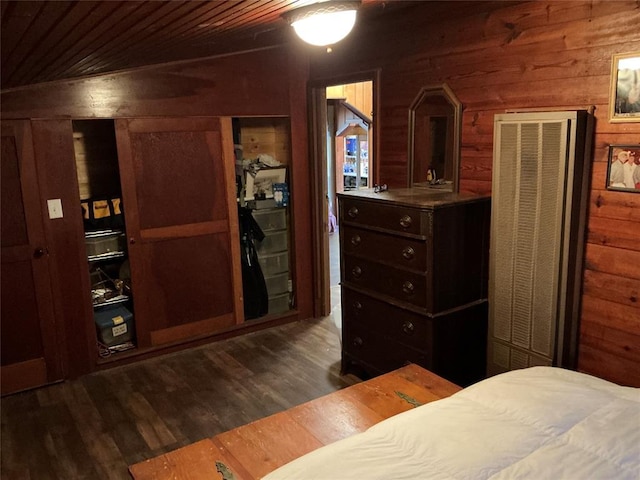 22 W Shore Dr, Arcadia, OK 73007 - bedroom featuring wood walls, wood ceiling, and dark wood-style flooring