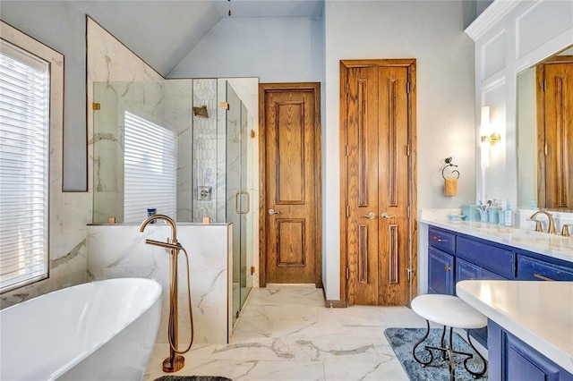 full bath with marble finish floor, a marble finish shower, a soaking tub, vanity, and vaulted ceiling