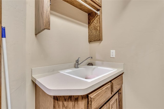 laundry room with a sink