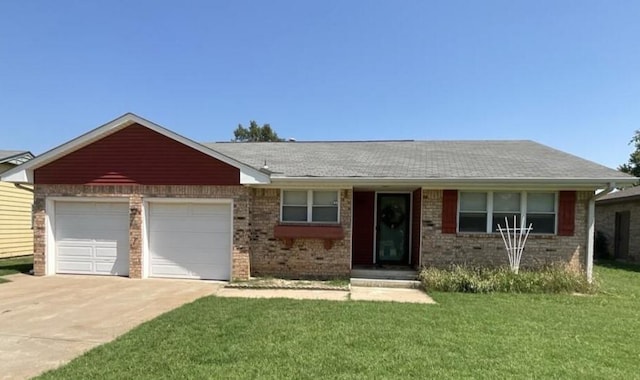 ranch-style home with a garage, concrete driveway, brick siding, and a front yard