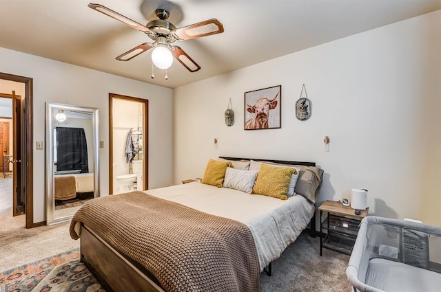 bedroom featuring carpet, connected bathroom, and a ceiling fan