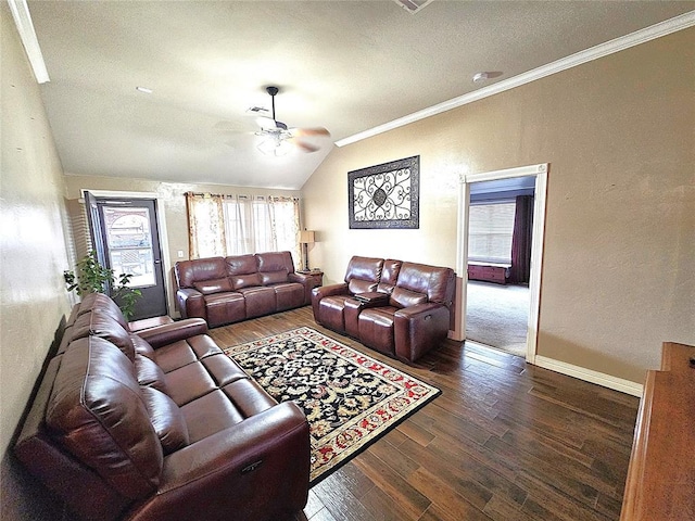 living room with lofted ceiling, ceiling fan, wood finished floors, baseboards, and crown molding