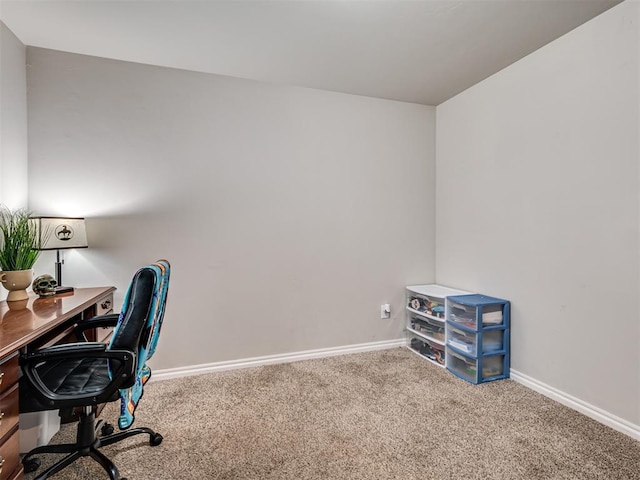 office space with carpet and baseboards