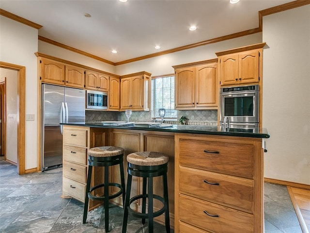 kitchen featuring baseboards, appliances with stainless steel finishes, dark countertops, and decorative backsplash