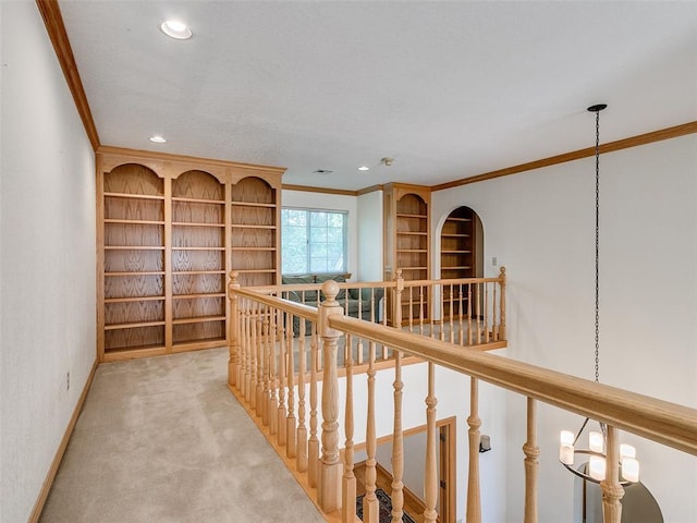 hall featuring light carpet, recessed lighting, an upstairs landing, and crown molding