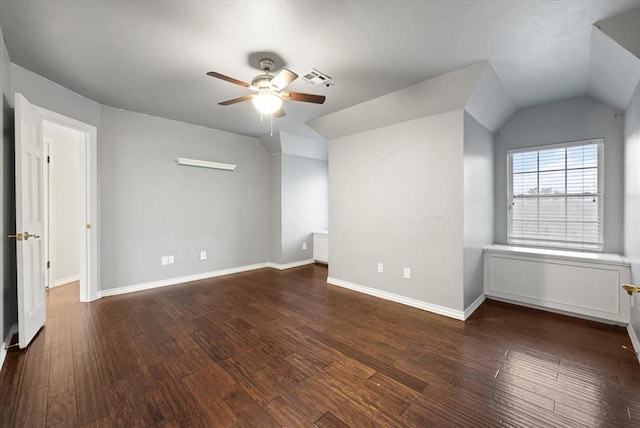 bonus room with baseboards, visible vents, a ceiling fan, lofted ceiling, and wood finished floors