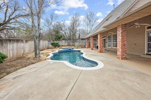 view of swimming pool featuring a patio area, a fenced backyard, a fenced in pool, and a ceiling fan