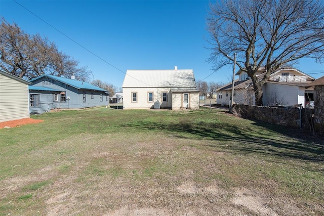 709 S Broadway, Geary, OK 73040 - rear view of house with a yard
