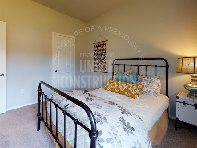 bedroom featuring carpet and baseboards