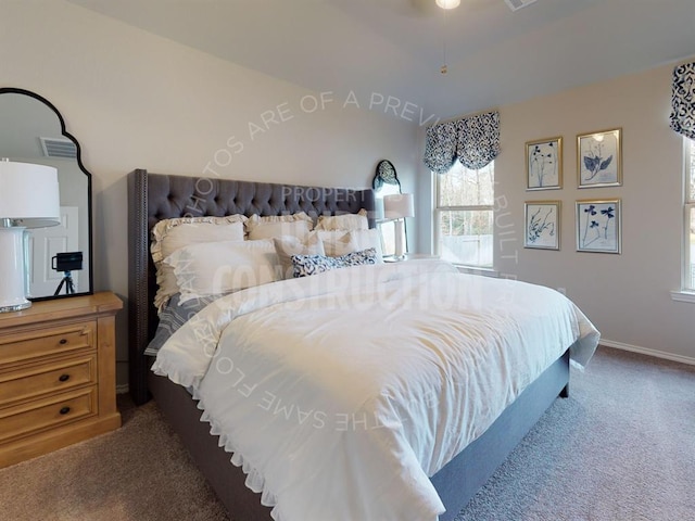 bedroom featuring lofted ceiling, carpet flooring, visible vents, and baseboards