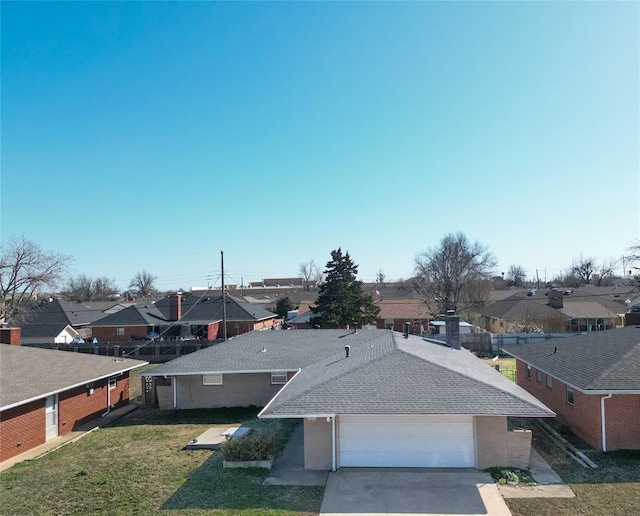 birds eye view of property with a residential view