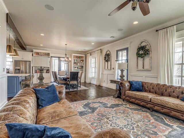 39 Boulevard, Carlton Landing, OK 74432 - living area with recessed lighting, a decorative wall, visible vents, dark wood finished floors, and crown molding