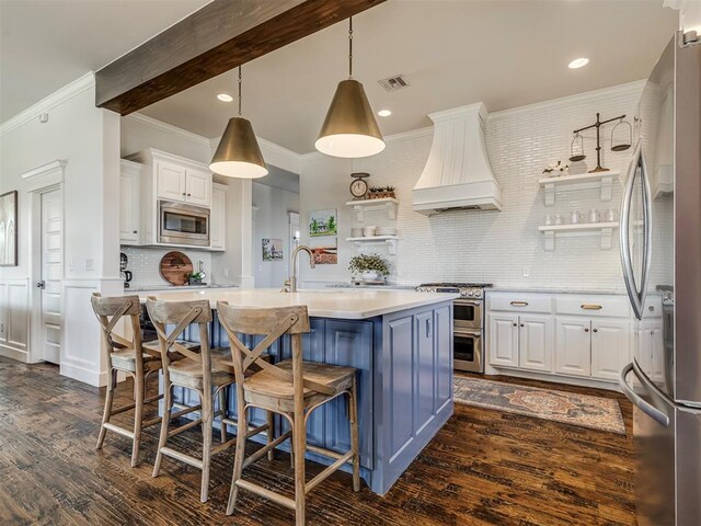 39 Boulevard, Carlton Landing, OK 74432 - kitchen featuring custom exhaust hood, open shelves, stainless steel appliances, light countertops, and white cabinetry