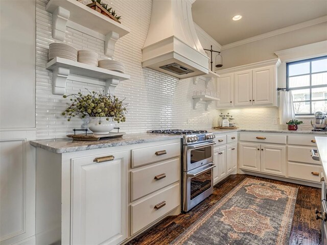 39 Boulevard, Carlton Landing, OK 74432 - kitchen featuring premium range hood, white cabinetry, ornamental molding, double oven range, and open shelves