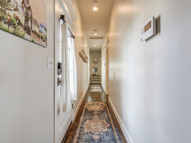 39 Boulevard, Carlton Landing, OK 74432 - hallway with baseboards, visible vents, dark wood finished floors, and recessed lighting