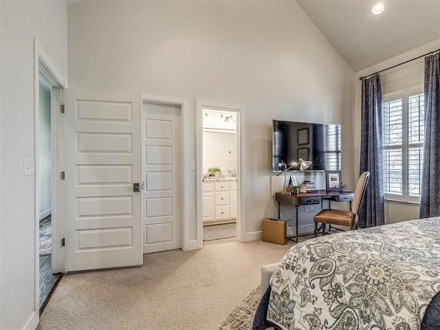 39 Boulevard, Carlton Landing, OK 74432 - carpeted bedroom featuring ensuite bath, baseboards, and high vaulted ceiling