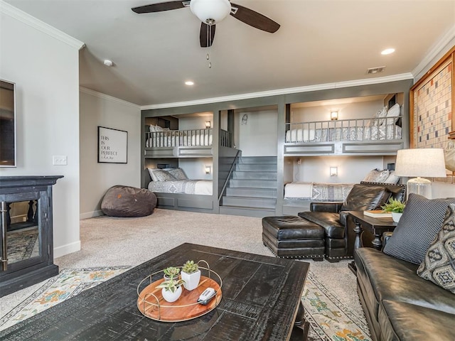 39 Boulevard, Carlton Landing, OK 74432 - living area with carpet flooring, visible vents, baseboards, stairway, and crown molding