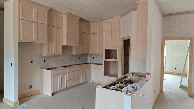 10200 Gentry Xing, Oklahoma City, OK 73169 - kitchen featuring baseboards, crown molding, and light brown cabinetry