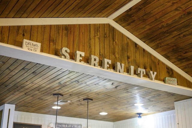 details featuring wooden walls and wood ceiling